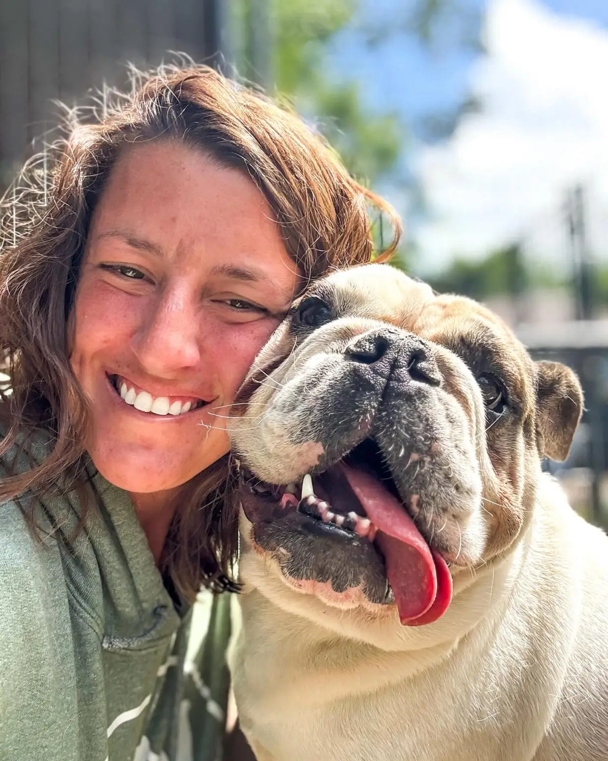 expert trainer having a good time with the dog, teaching new lessons